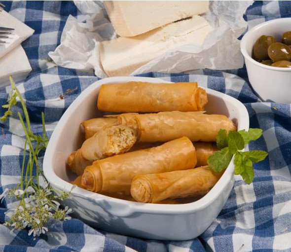Flogeres (cheese rolls) with feta cheese and fresh spearmint