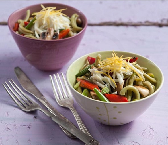 Vegetable stir fry with striftaria pasta, cheese and lemon zest