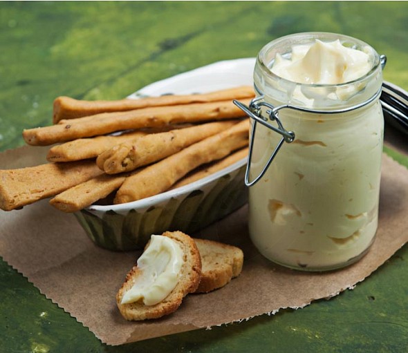Homemade mayonnaise with olive oil and herbs