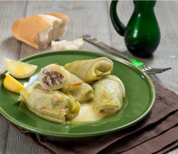 Stuffed cabbage leaves with minced meat in egg-lemon sauce